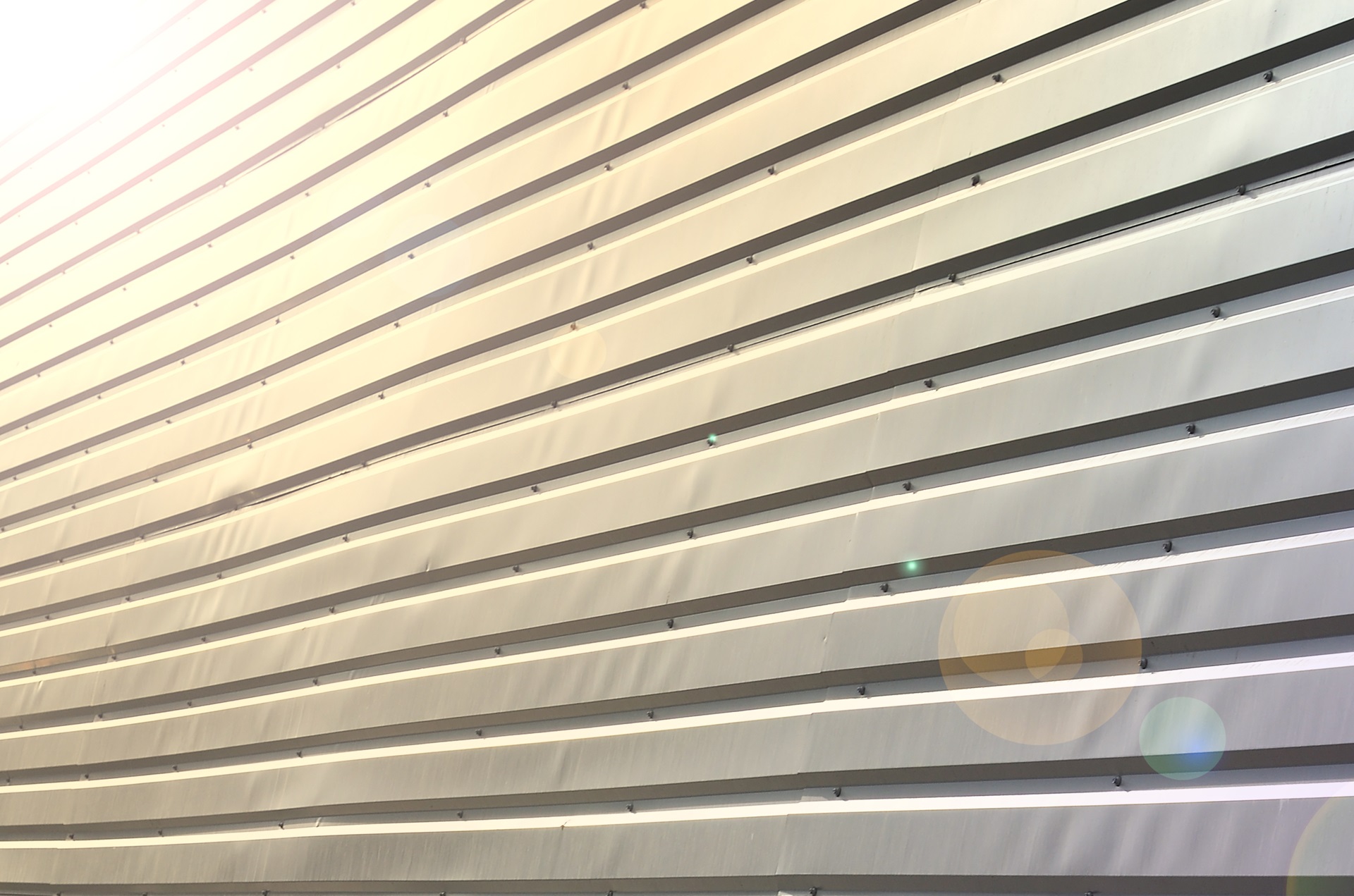 The texture of the wall is made of metal coating of huge aluminu